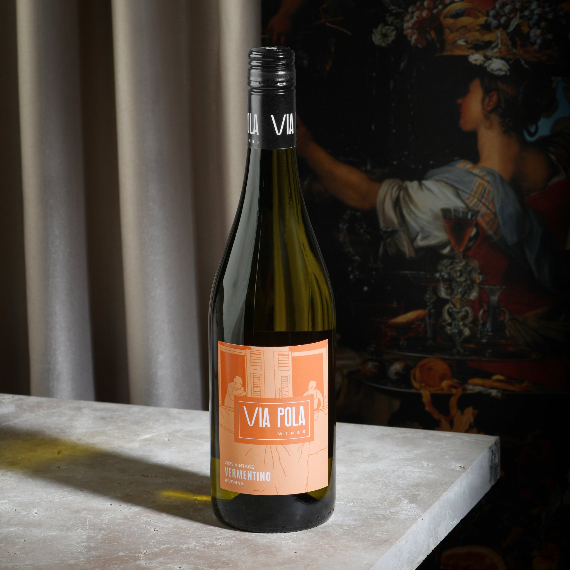 Wine bottle with a label on a table with a dark background